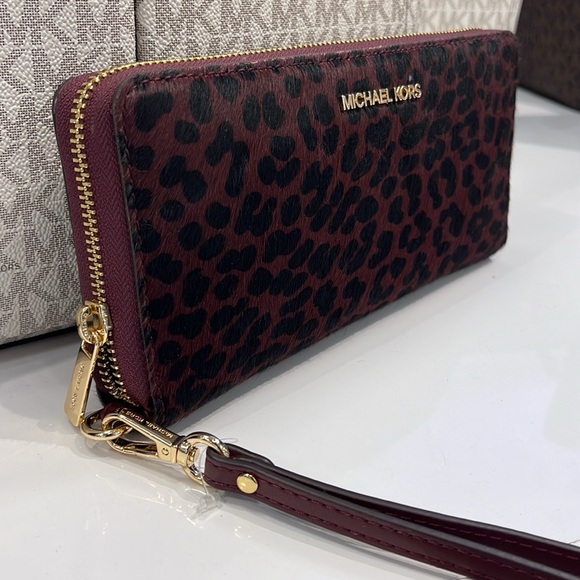 MICHAEL KORS
Leather Lg Continental Wristlet Case Wallet Exotic Print Hair Culf - Picture 13 of 16